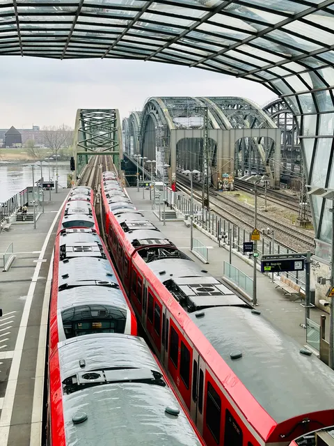 Trains beneath a station’s glass roof, Germany