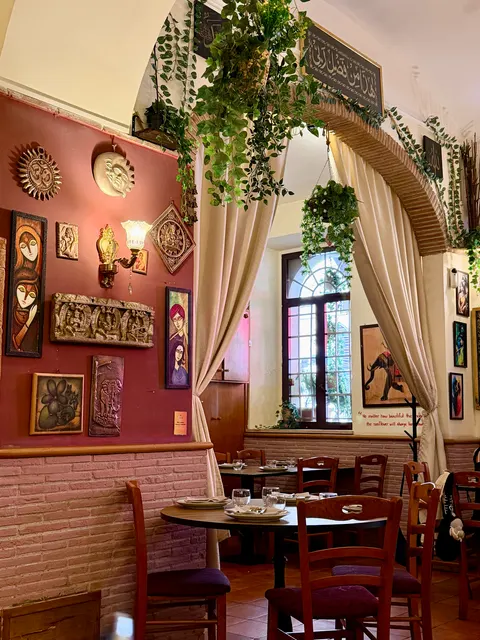 A warmly lit restaurant interior, Italy