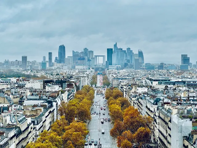 Paris rooftops beneath autumn clouds, France