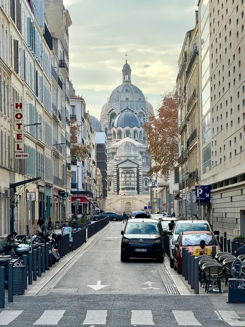 A Paris street leading toward a domed church, France