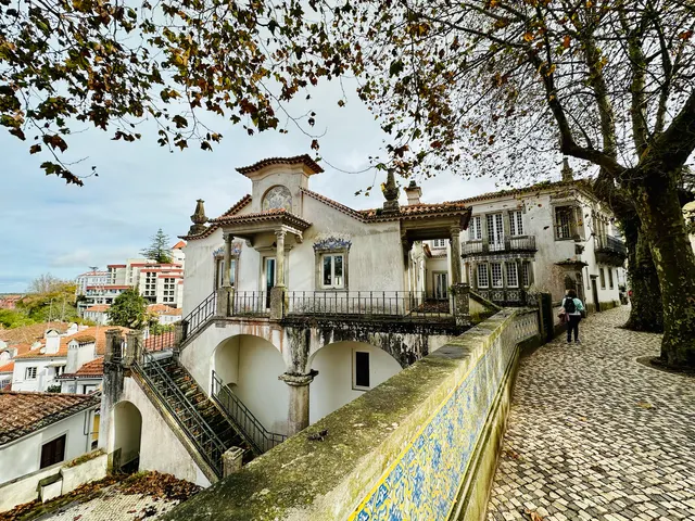 A staircase in a wooded palace garden, Portugal