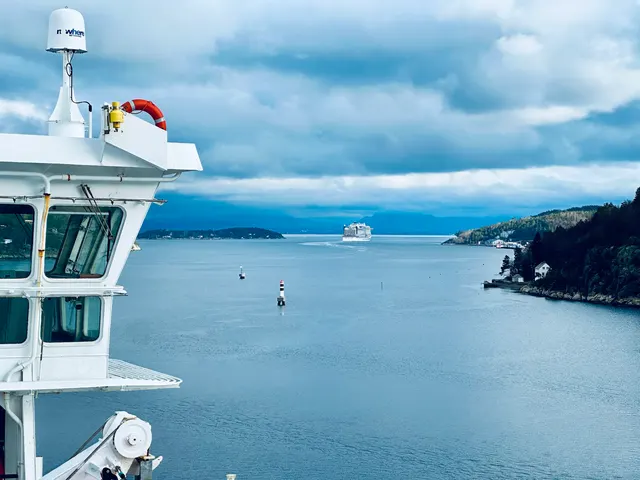 A ferry entering a Norwegian fjord, Norway