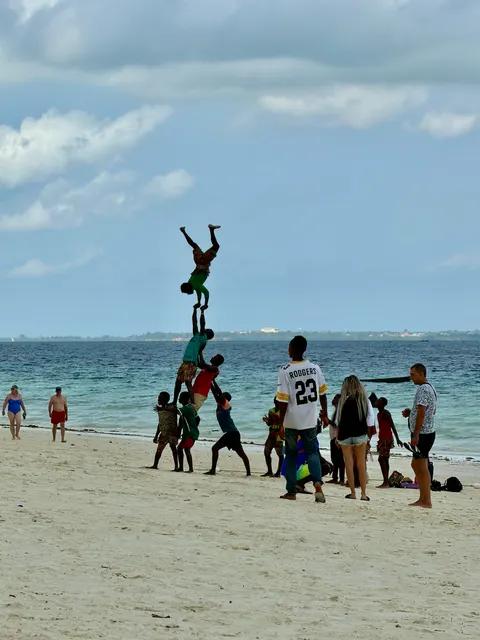 People playing on a Zanzibar beach, Tanzania