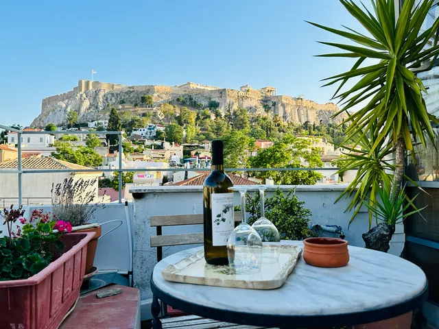 A rooftop table overlooking Athens, Greece