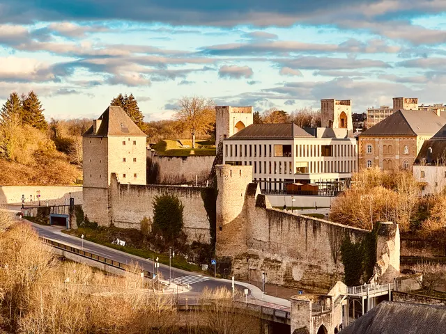 Stone walls and towers in autumn light, Luxembourg