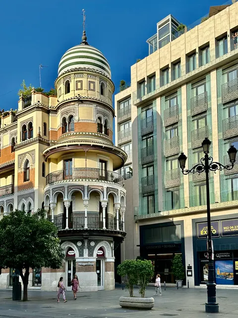 An ornate corner building in Seville, Spain