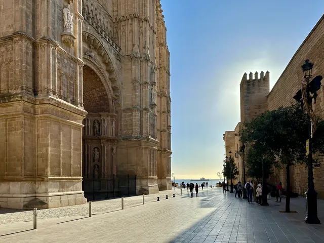 A Gothic doorway in a sunlit lane, Spain
