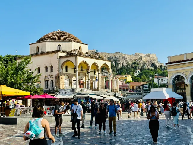 A busy square beneath the Acropolis, Greece