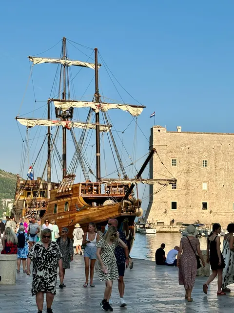 A sailing ship beside Dubrovnik’s walls, Croatia