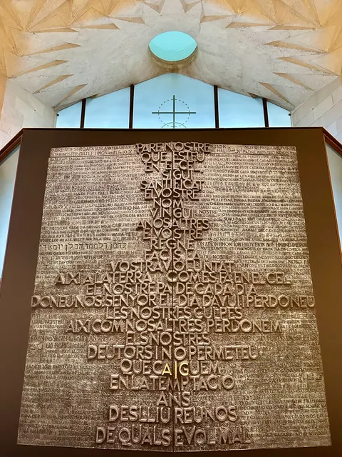 A wall of lettering inside a church, Spain