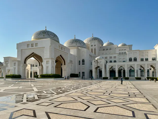 White domes across a patterned courtyard, United Arab Emirates