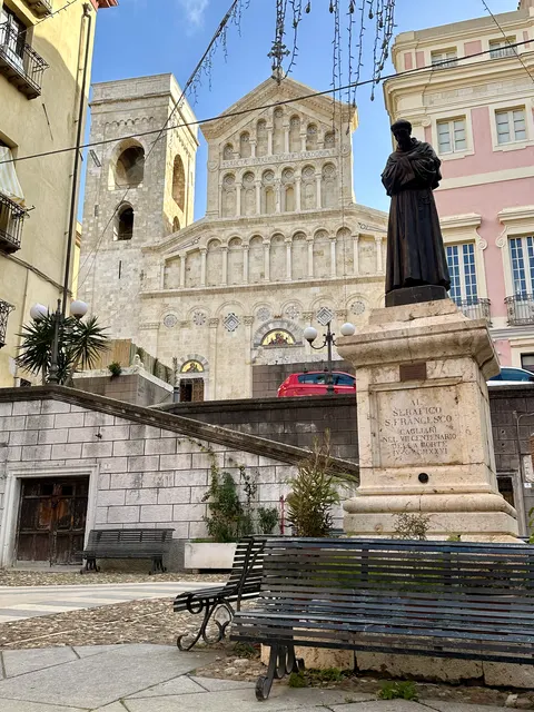 A cathedral above a broad staircase, Italy