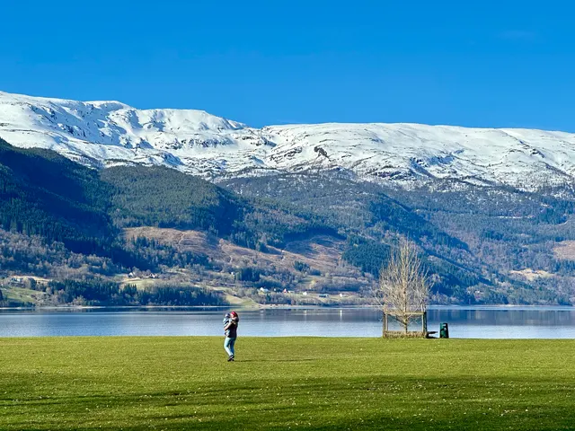 Snowy mountains beyond a fjord, Norway
