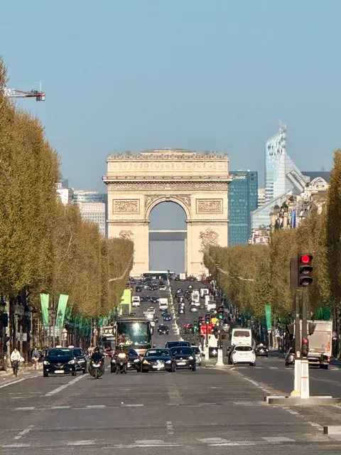 The Arc de Triomphe beyond a busy avenue, France