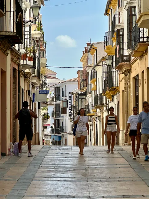 A narrow shopping street, Spain