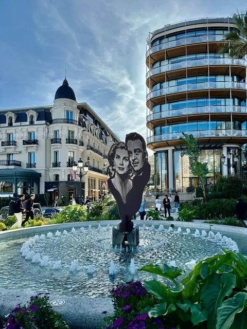 A fountain beneath Monaco’s ornate buildings, Monaco