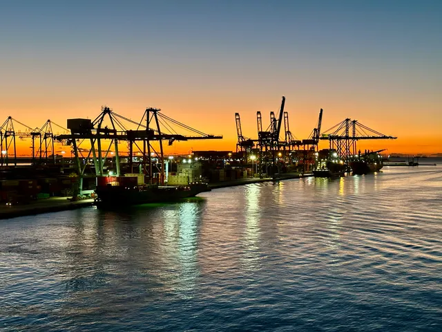Harbor cranes at sunset, Spain