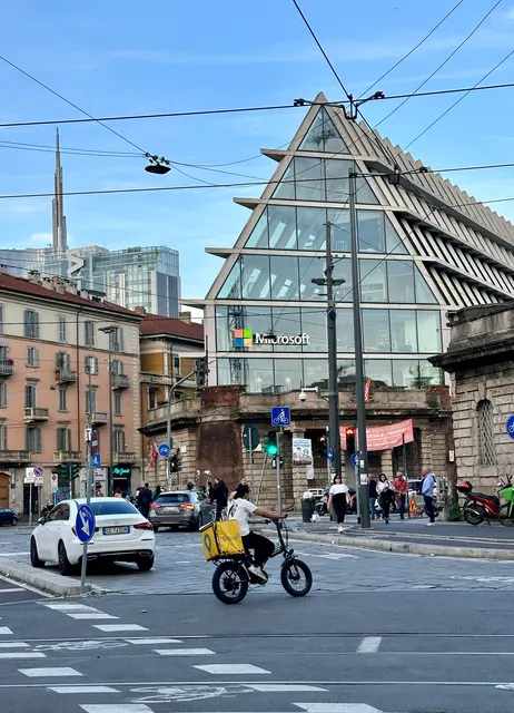 A glass pyramid in a city square, Italy