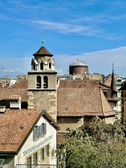 Tiled rooftops and a church tower, Switzerland