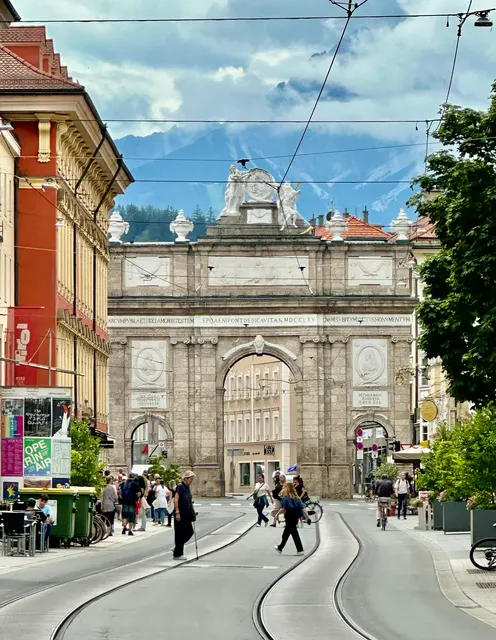 Triumphal arch beneath a cloudy sky, Austria