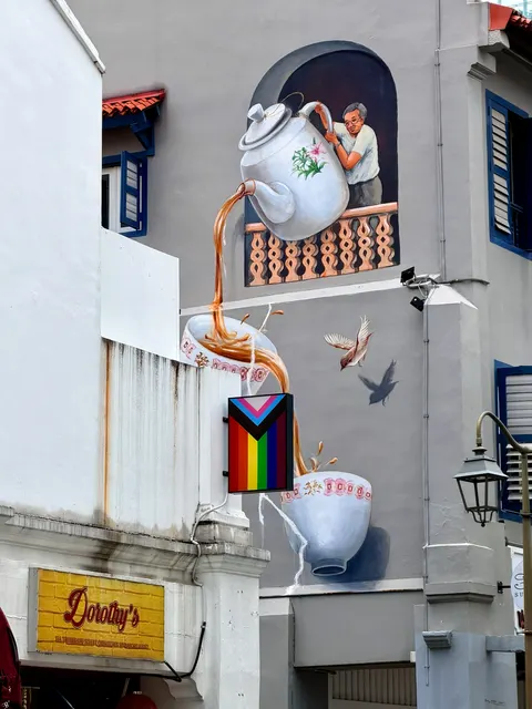 A mural beside a white facade, Singapore