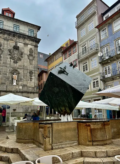 A stone monument in a city square, Portugal