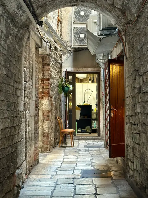 A passage through an ancient stone building, Croatia