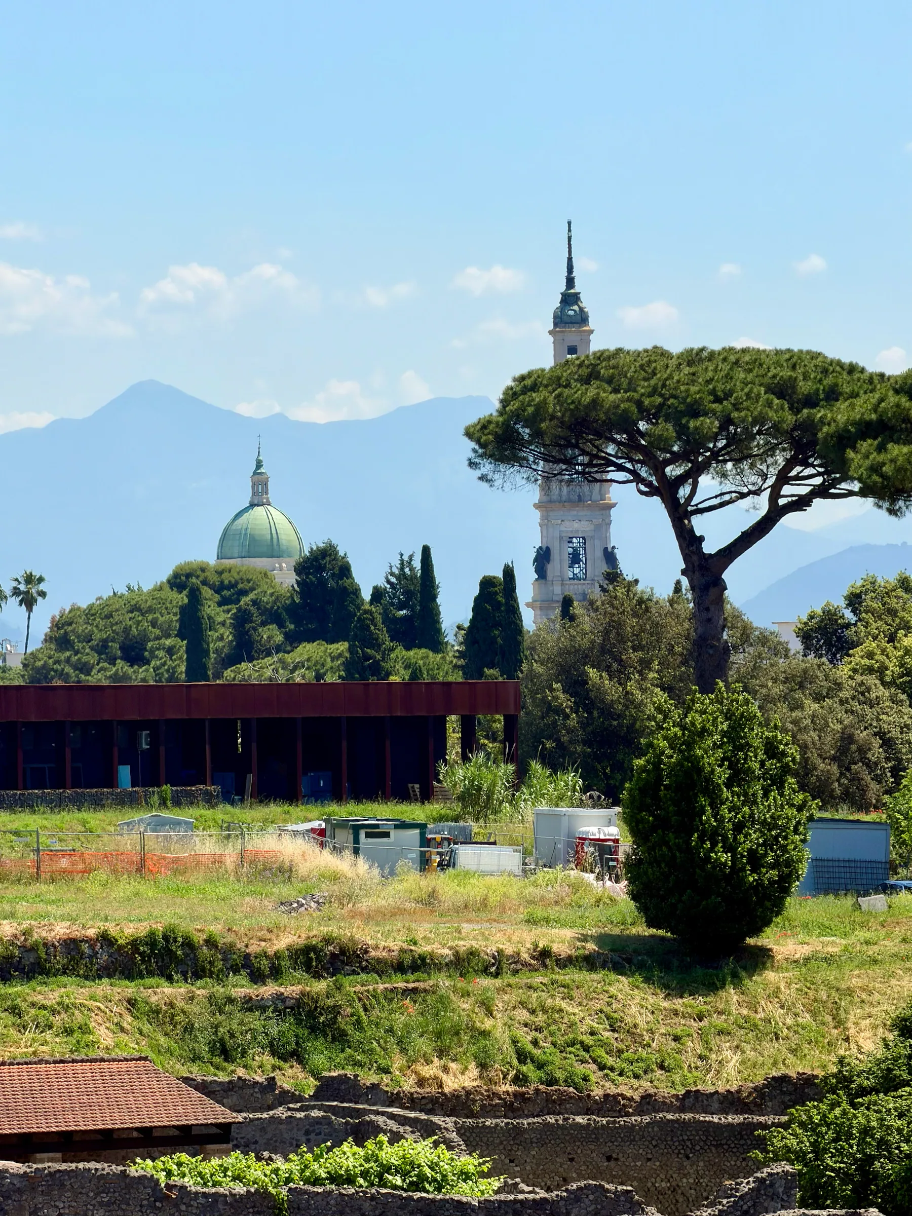 Formal gardens beneath a mountain backdrop, Italy