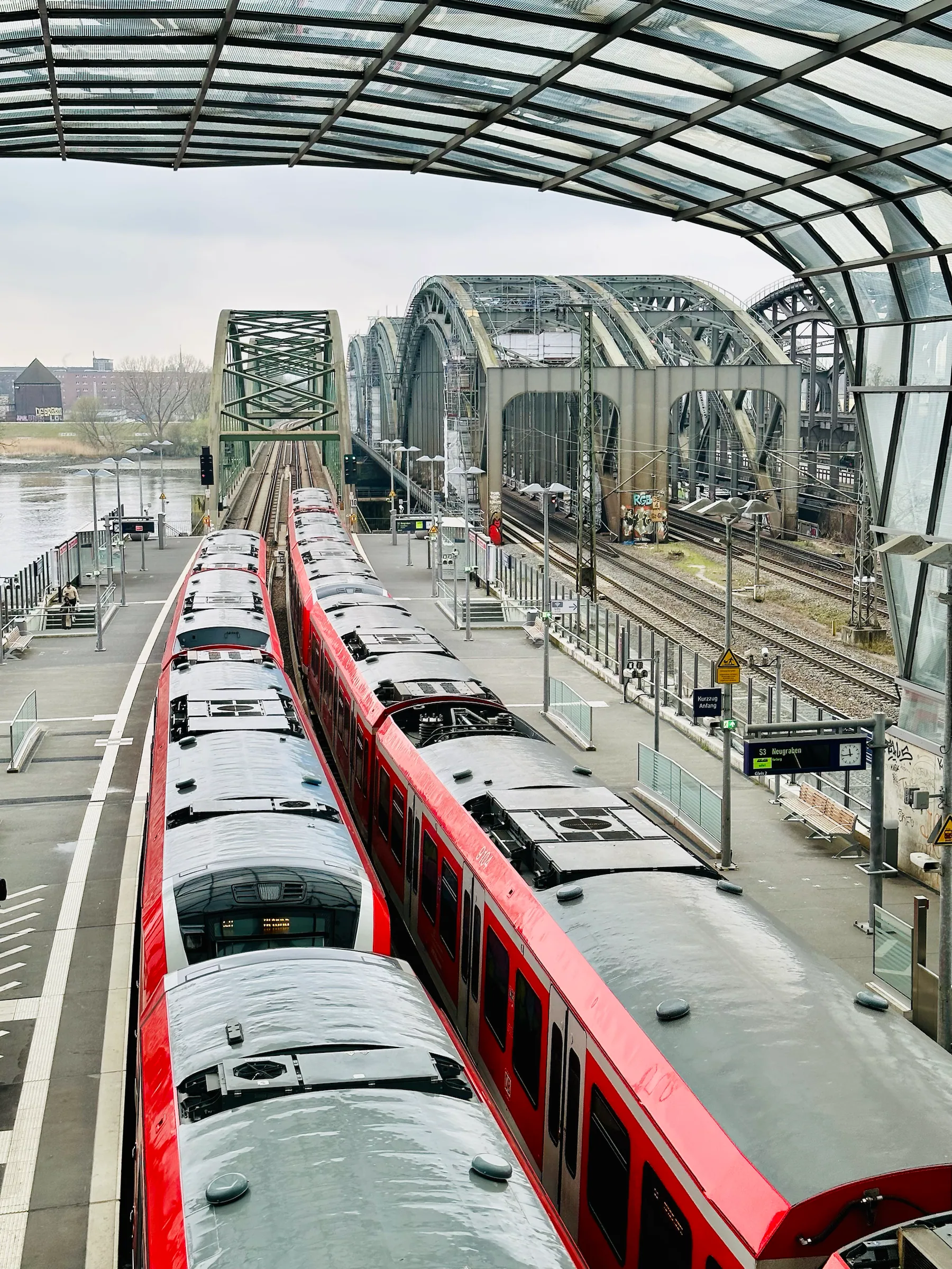 Trains beneath a station’s glass roof, Germany
