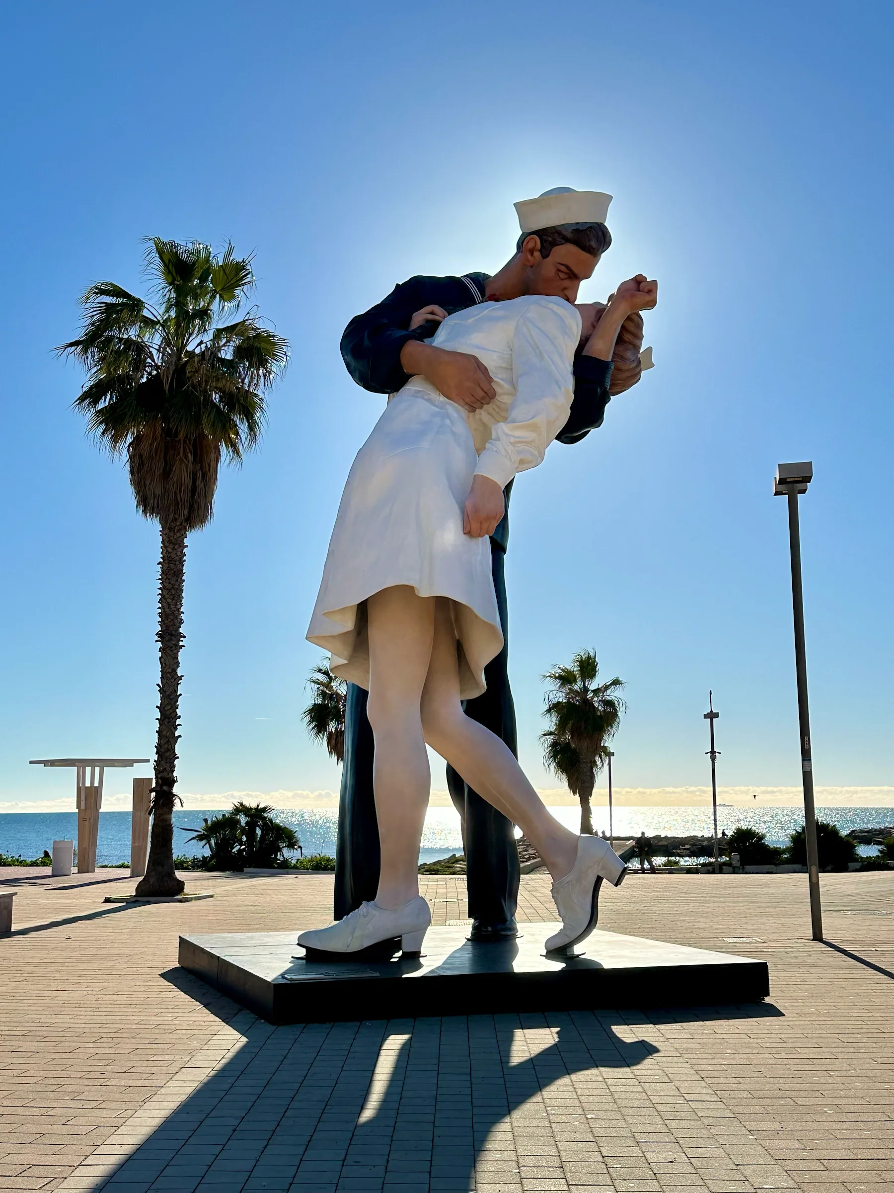 A sculpture beside the waterfront, Italy