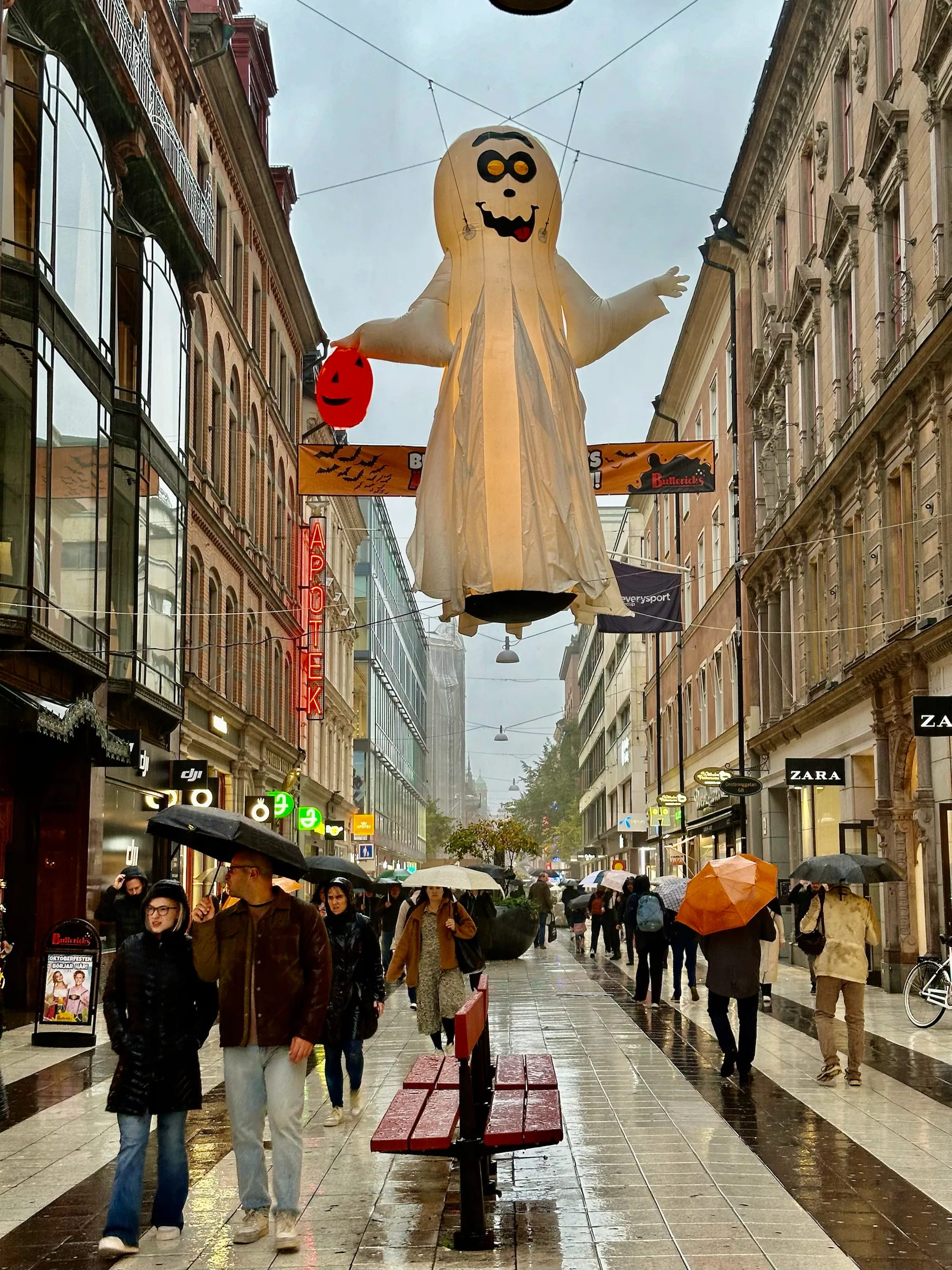 Decorations above a narrow shopping street, Sweden