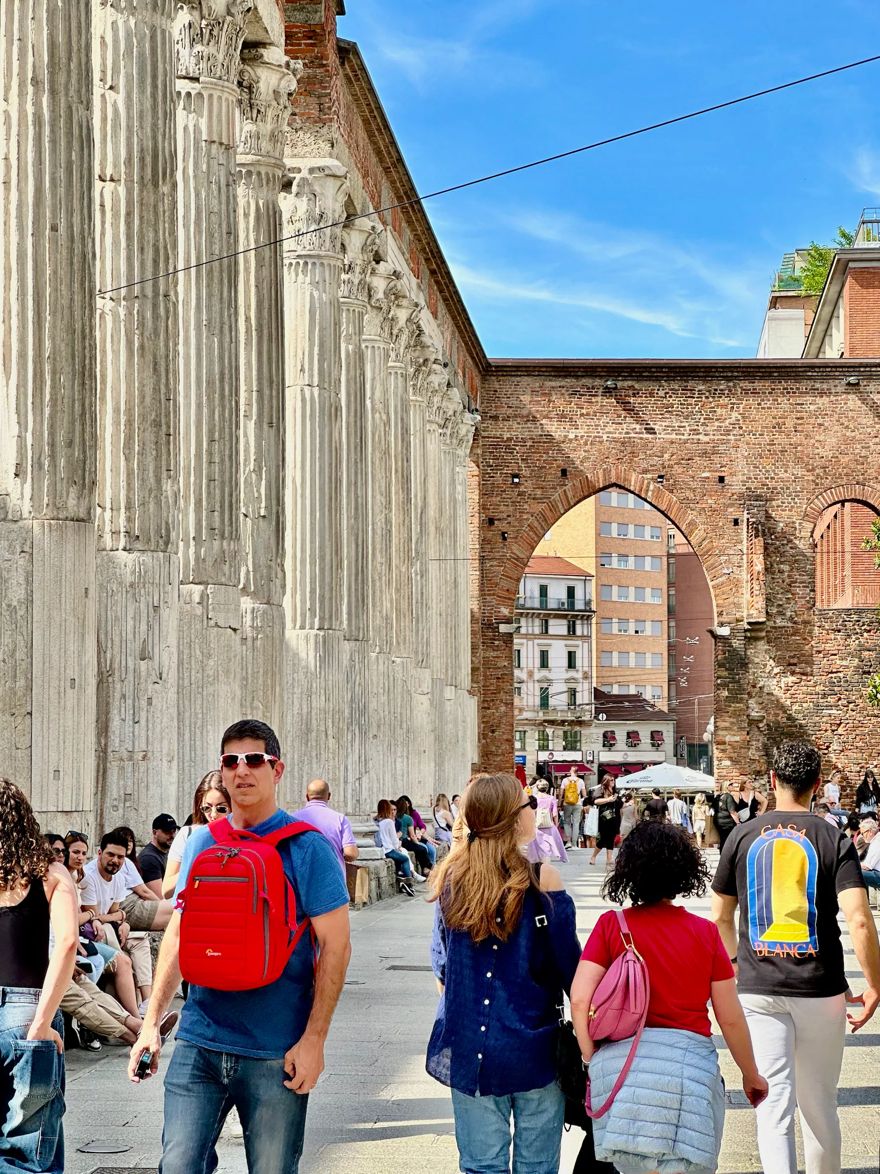 Tall stone columns beside a street, Italy