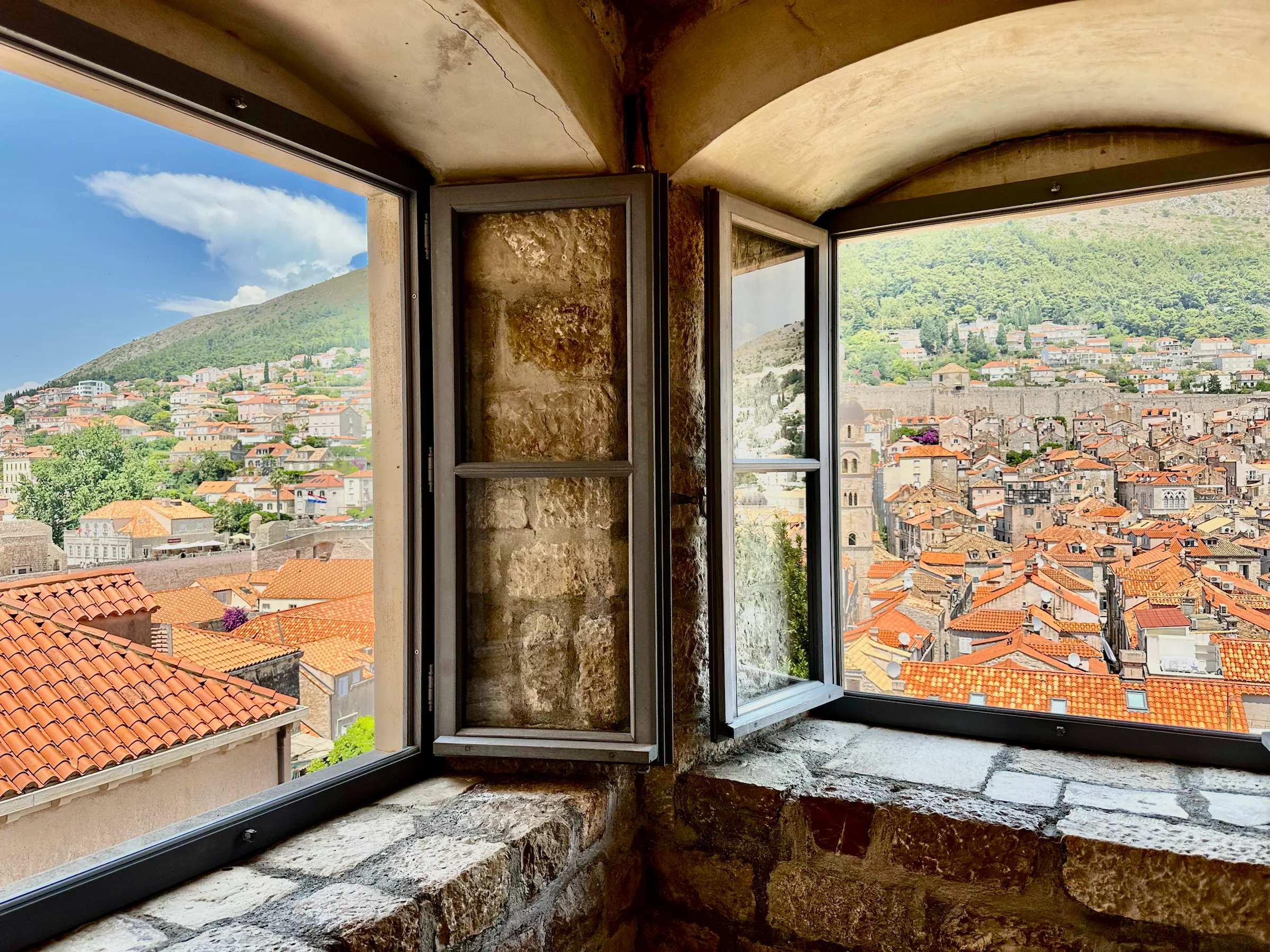 Dubrovnik rooftops framed by an open window, Croatia