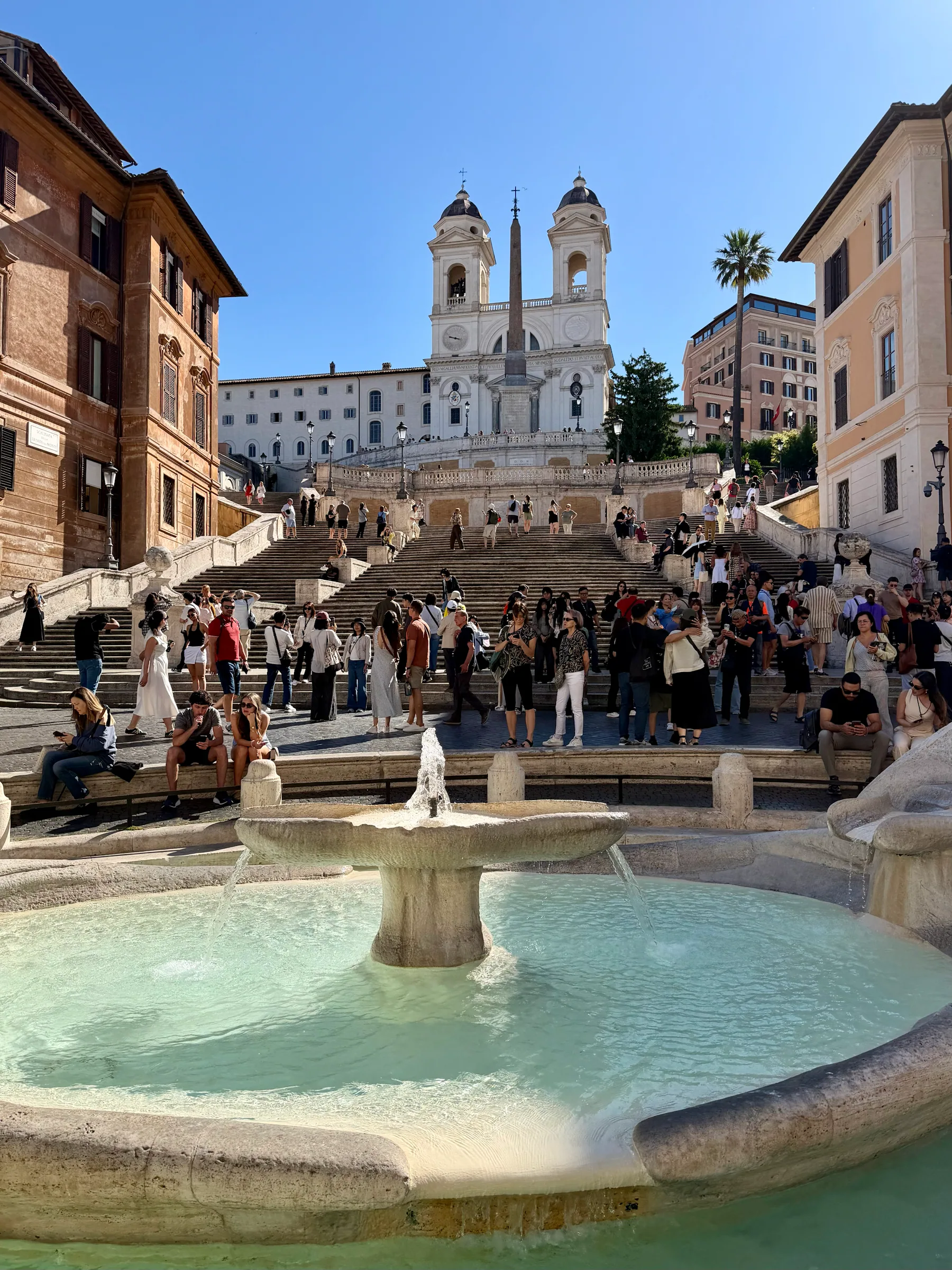 The Spanish Steps beyond a fountain, Italy