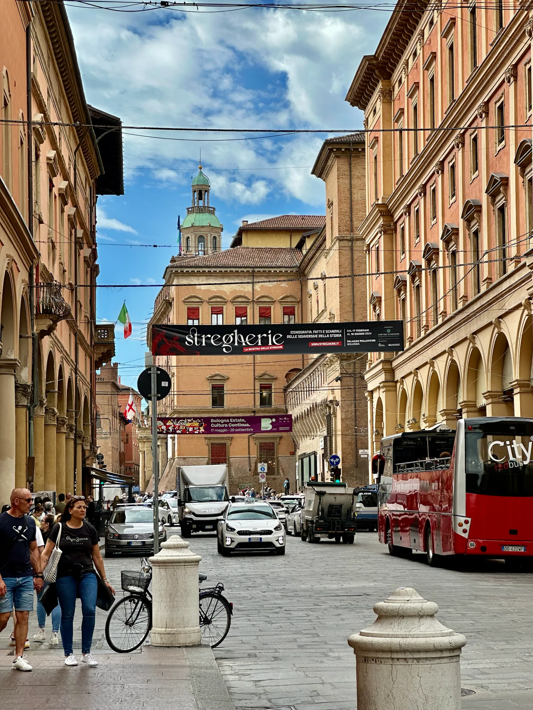 A street leading toward a church facade, Italy