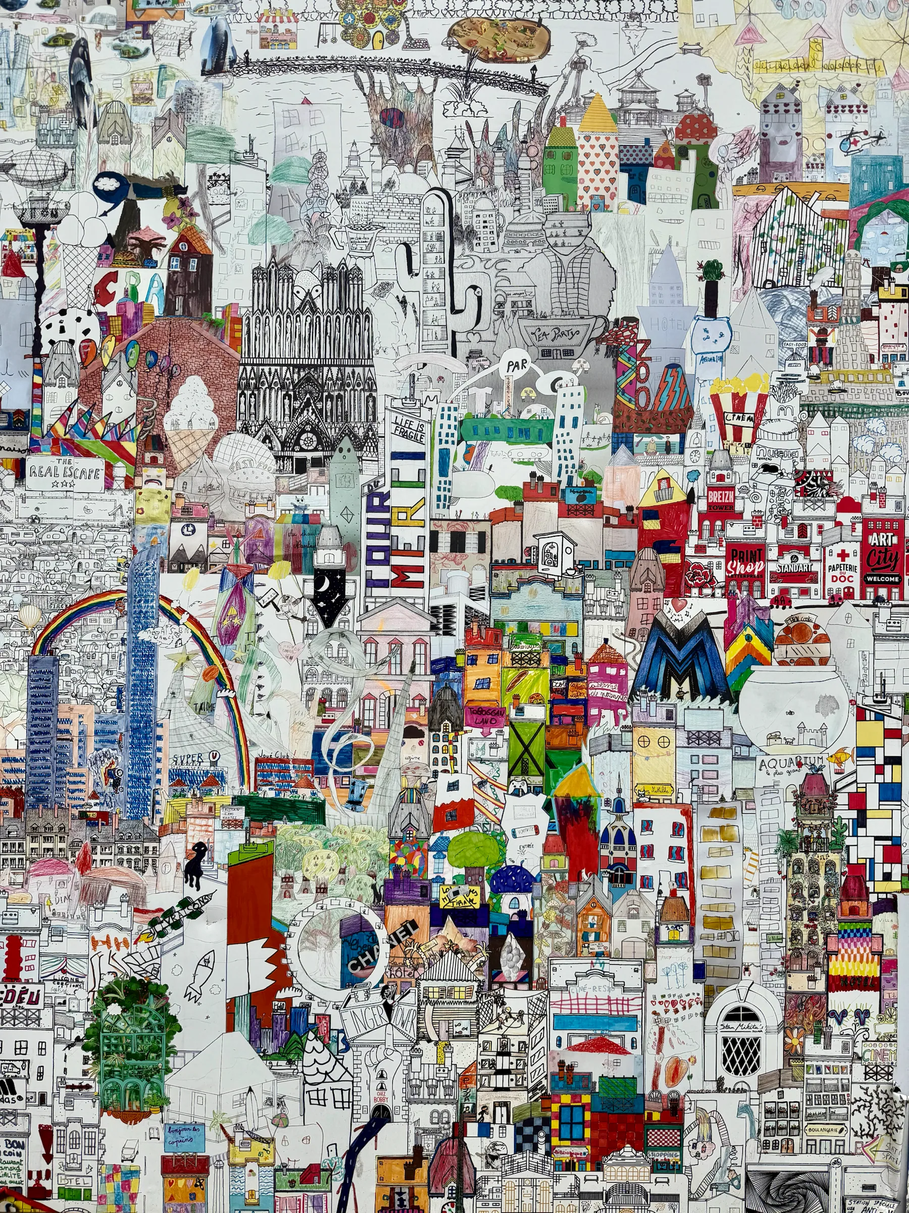 A wall covered with posters and stickers, France