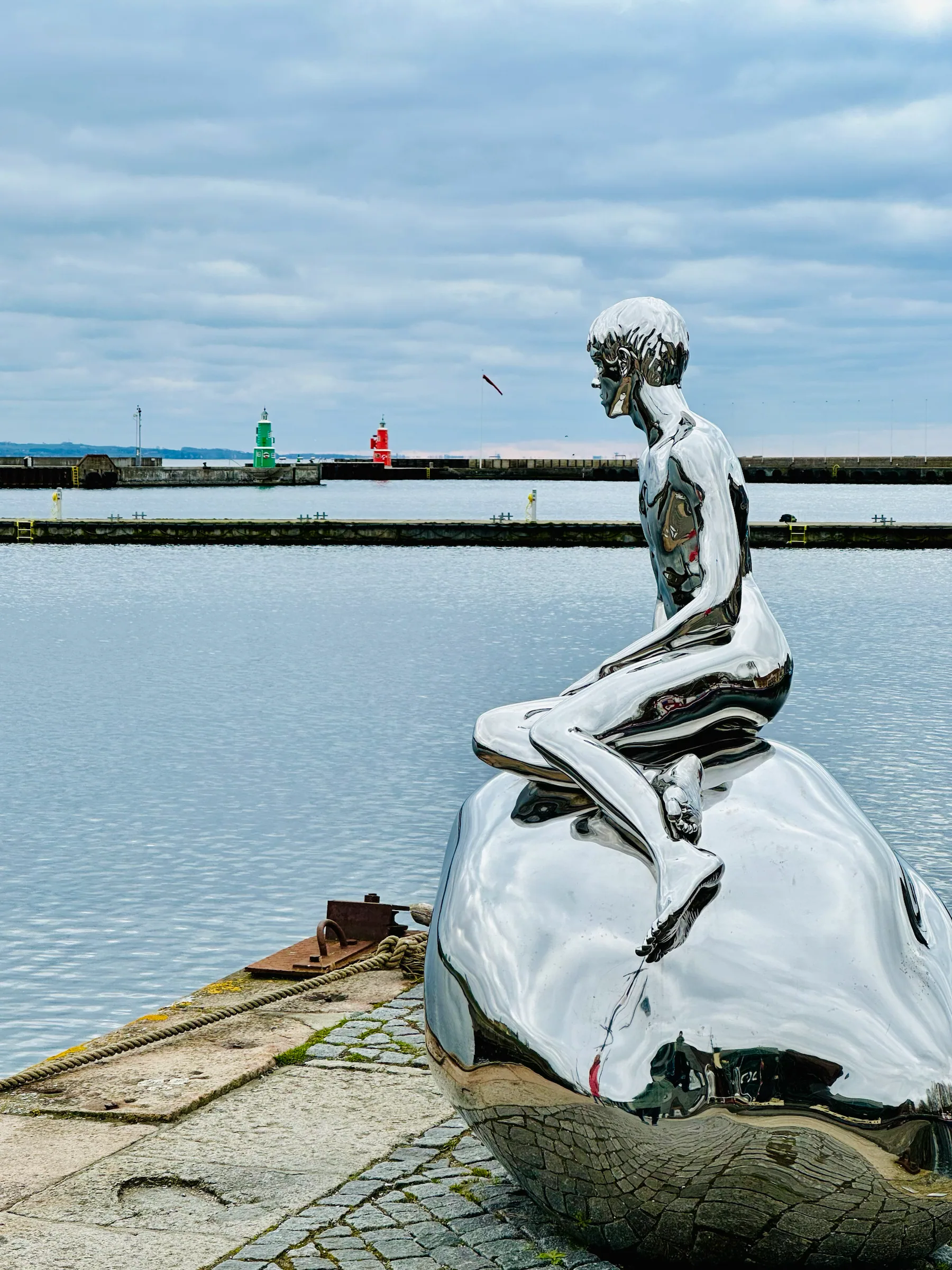 The Little Mermaid overlooking the harbor, Denmark
