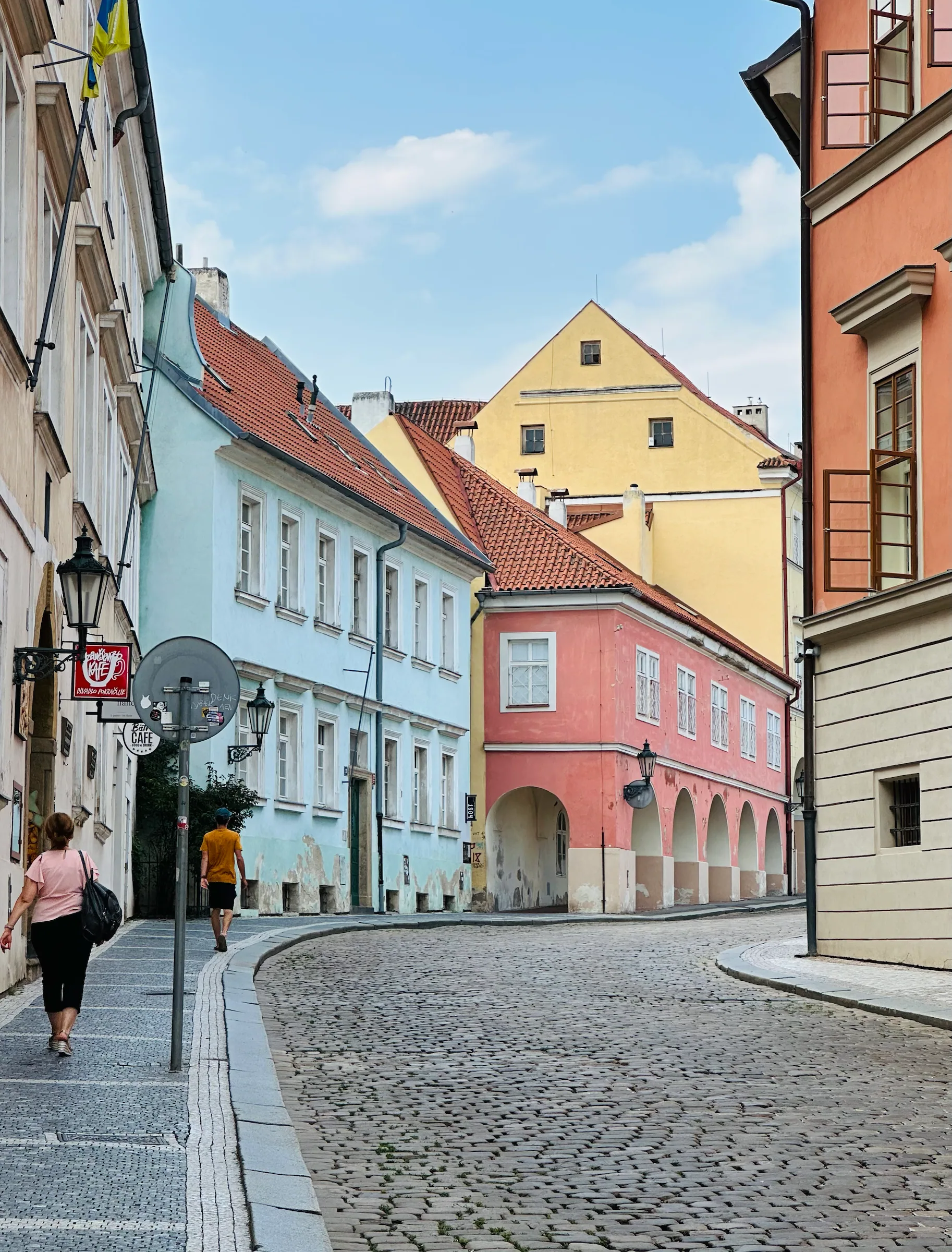 A cobbled street lined with pastel buildings, Czech Republic
